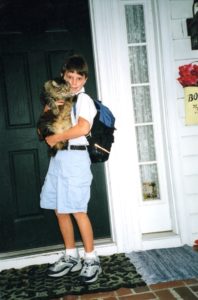 One of those amazing "First day of school memories." Andy went to 5th grade at Betton Hills School, August 2005, pictured here with our outdoor cat Marilyn.