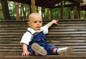 Our youngest, Andy at 14 months in April 1996, on the big porch swing at the Tallahassee Museum, always a favorite!